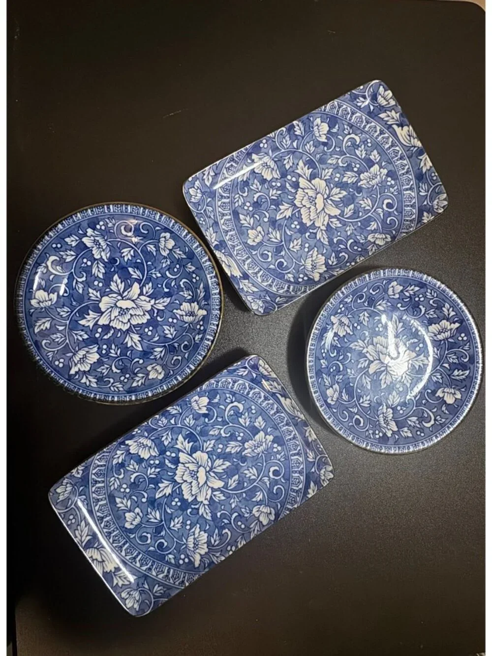 Vintage Japanese porcelain set of 4 plates, blue and white floral